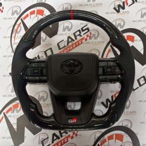 TIMON TOYOTA TIPO AVION EN CARBONO  FORJADO MANDOS Y EMBLEMA NEGRO